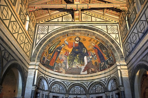 The medieval Romanesque style Byzantine mosaic of Christ between the Virgin Mary and St Minias