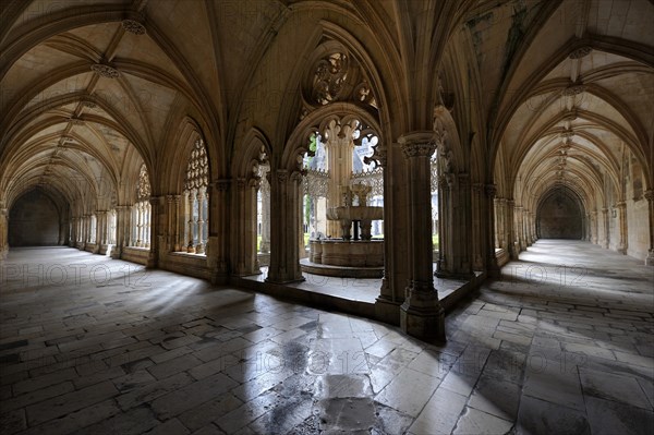 Cloister with a well house in the middle