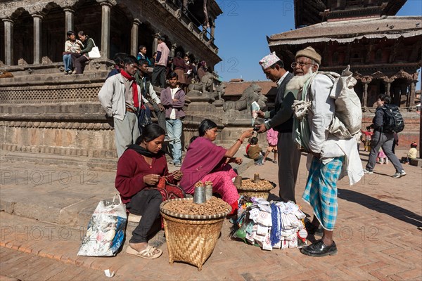 Peanut sellers in front of the Krishna Temple