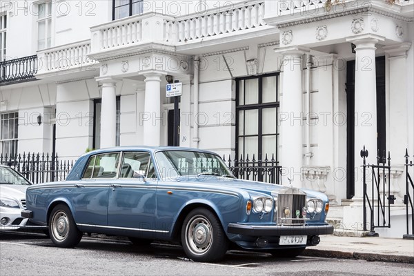 A Rolls Royce Silver Shadow II parked in front of a row of houses in the exclusive district of Knightsbridge