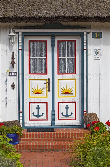 Typical carved and painted door of a wood house