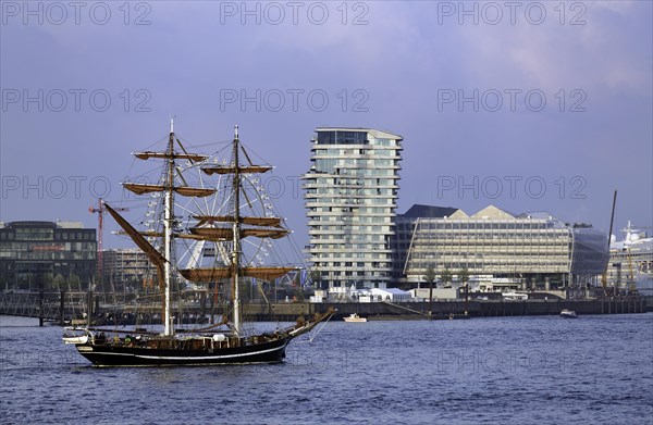 Historic sailing ship in front of esidential Marco Polo Tower and Unilever-Haus office building