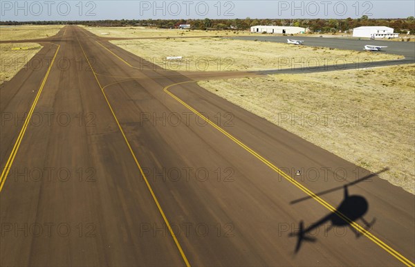 Helicopter approaching the airport of Maun