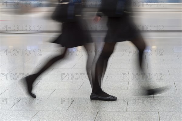 Moving legs of a person in a hurry