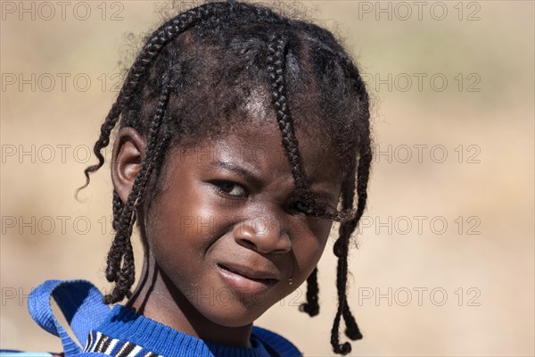 Local girl with pigtails