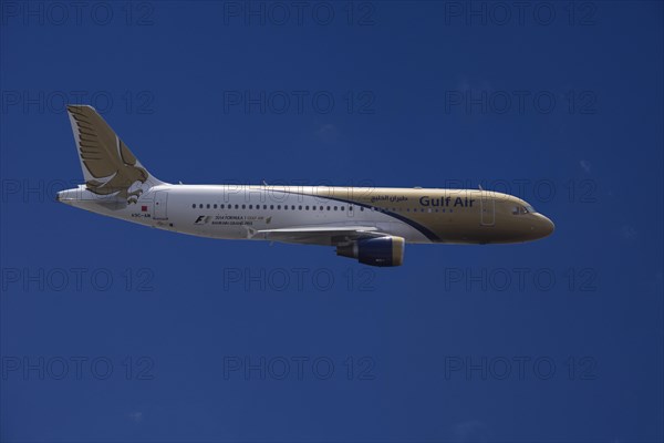 A9C-AM Gulf Air Airbus A320-214 in flight