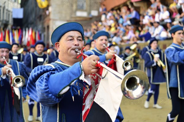 Festive parade before the historic horse race Palio di Siena