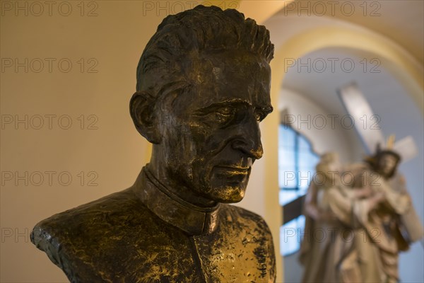 Monument to Father Rupert Mayer in the lower church of the Burgersaalkirche church