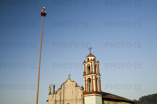 Voladores performing at a village festival