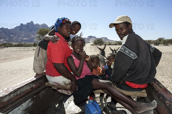 Local family travelling on a donkey carts