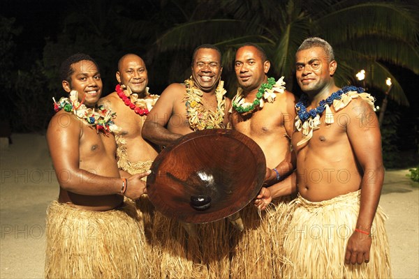 Men taking part in the Kava Ceremony