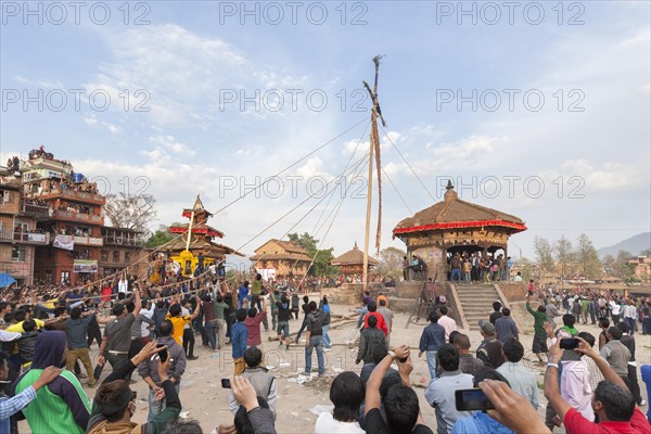A 25m high pole or lingam is pulled to the ground during the Bisket Jatra New Year celebrations