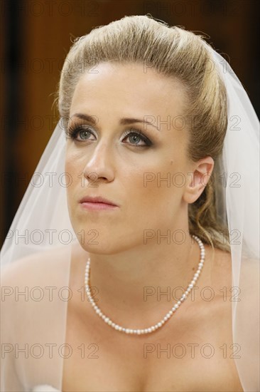 Portrait of the bride at the altar