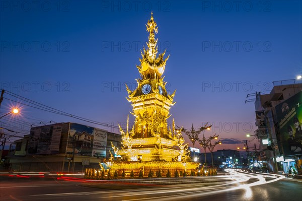 Clock Tower at night with light trails of vehicles