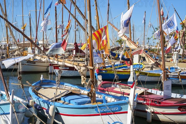 Traditional colourful wooden fishing boat in the port