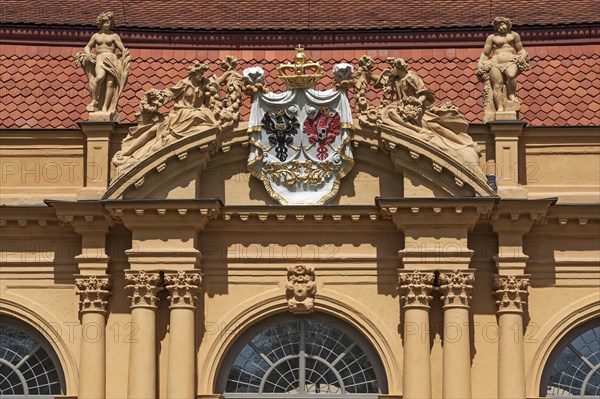 Alliance coat of arms of the margrave's builders surrounded by deities at the orangery in the castle grounds