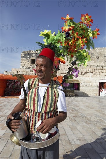 Tea vendor in traditional dress