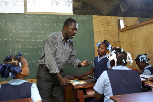 Teaching in a school for earthquake refugees