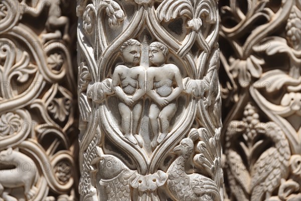 Adam and Eve sculpted in the medieval columns of the cloisters of Monreale Cathedral