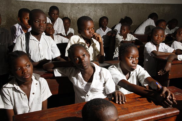 School children in school uniform during class