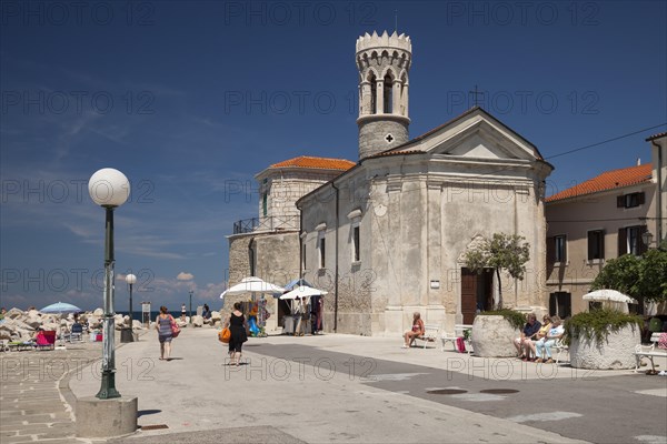 Waterfront with St Clement or Our Lady of Health Church and lighthouse