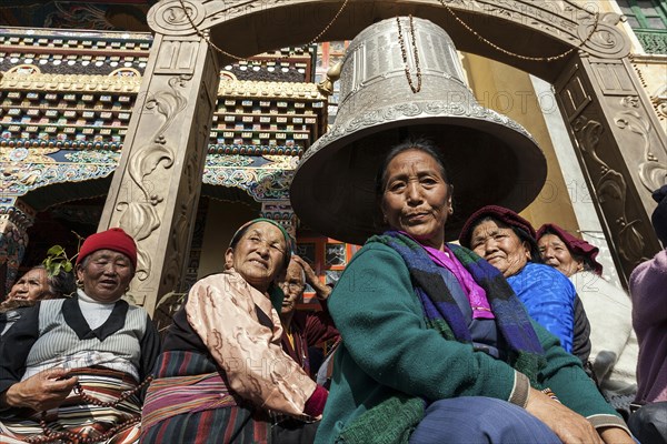 Native people in front of the Cinya Llama Gompa