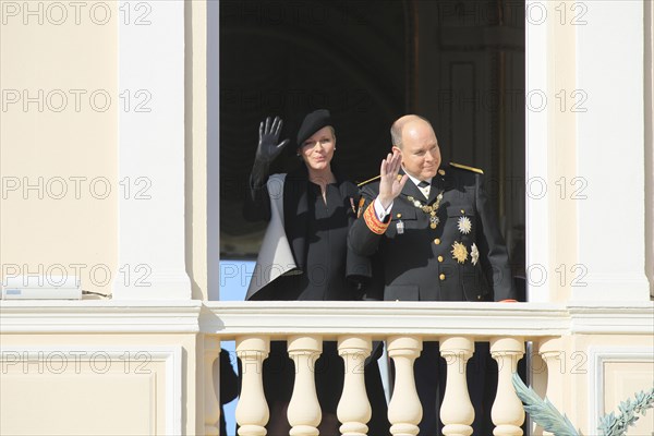 Princess Charlene and Prince Albert II. of Monaco at the Prince's Palace on Fete du Prince national holiday