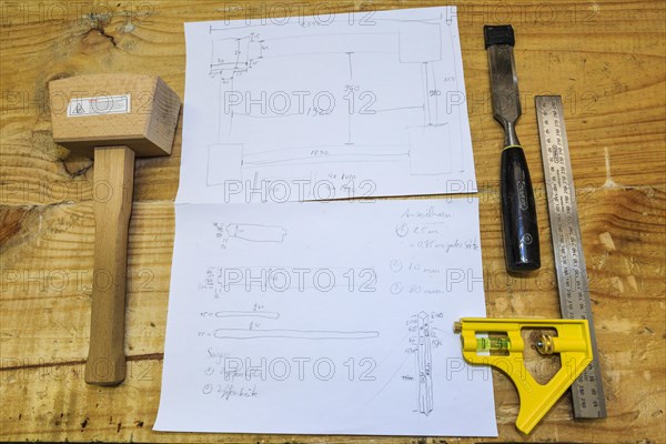 Woodworking tools and a construction plan
