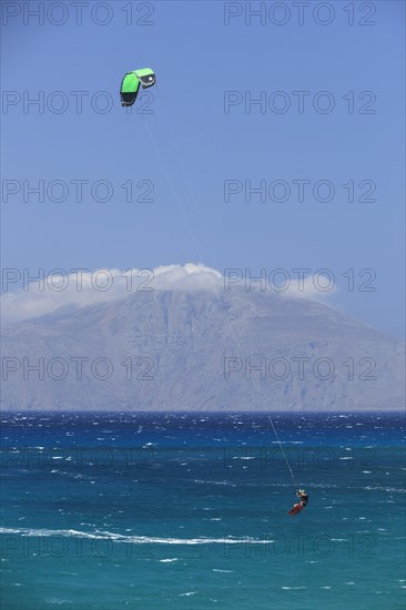 Kitesurfer in aquamarine water