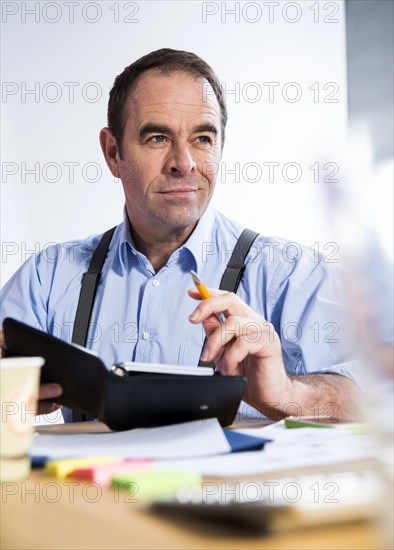 Businessman checking his schedule