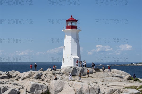 Lighthouse on granite rocks in Peggys Cove