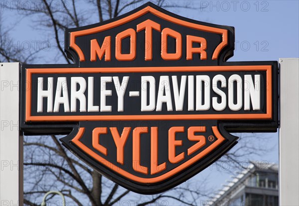 Company sign and the logo of Harley Davidson