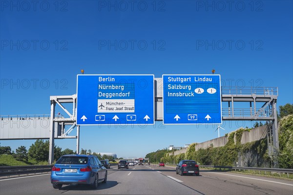 Information signs and greened noise protection wall on the A9 near Munich