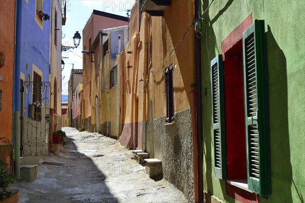 Colourful houses in a narrow alleyway of the historic centre