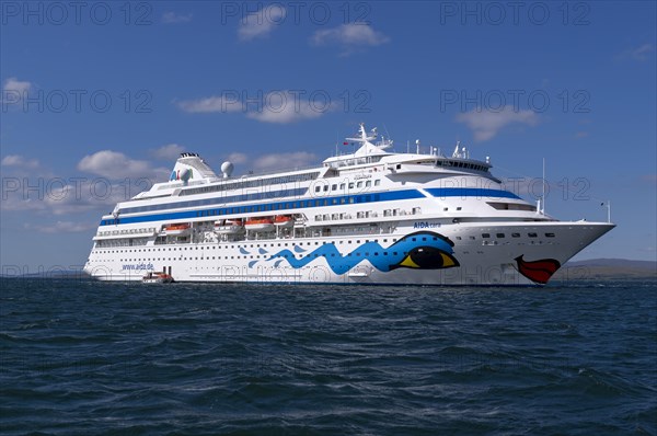 The cruise ship AIDAcara at anchor off Oban