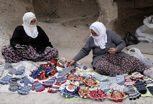 Women offering handicrafts