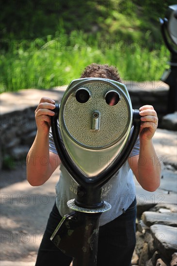 Person at binoculars