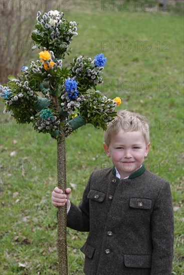 Boy with palm branches