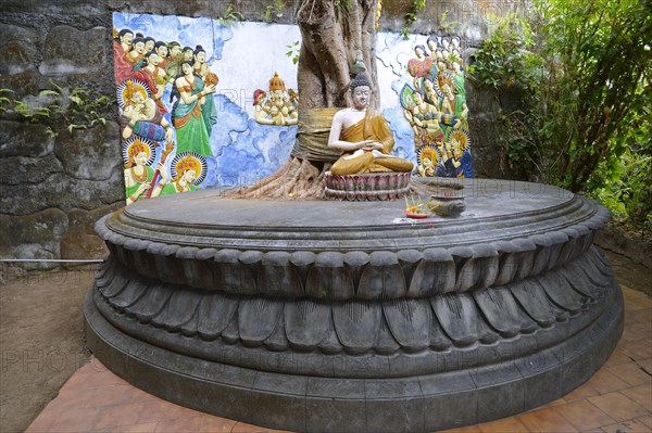 Buddha statue on an altar outside of the Buddhist Brahma Vihara Monastery