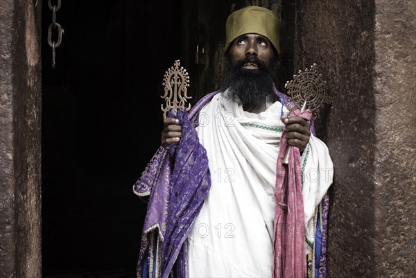 Priest in prayer