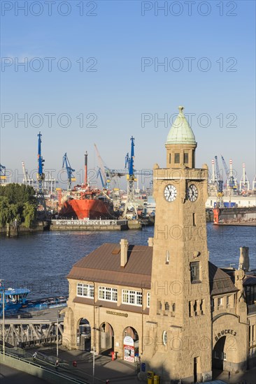 Water level tower of St. Pauli Landing Stages with the floating storage vessel Petrojarl Banff in the dry dock of Blohm und Voss