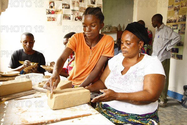 Women doing pottery