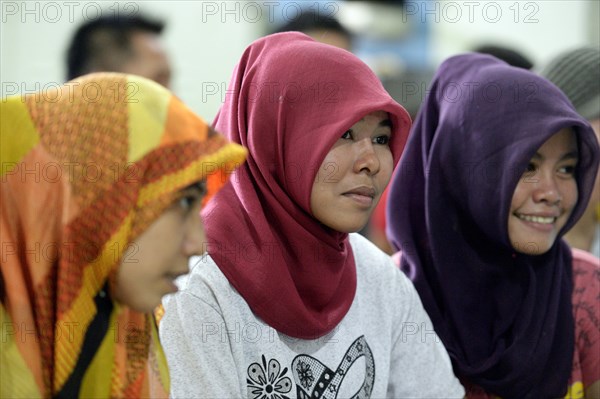 Young Muslim women with headscarves