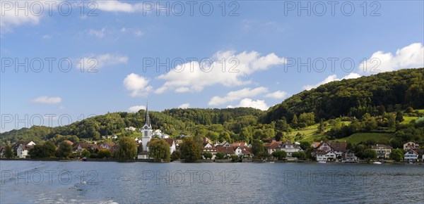 Views of the church and waterfront of Berlingen