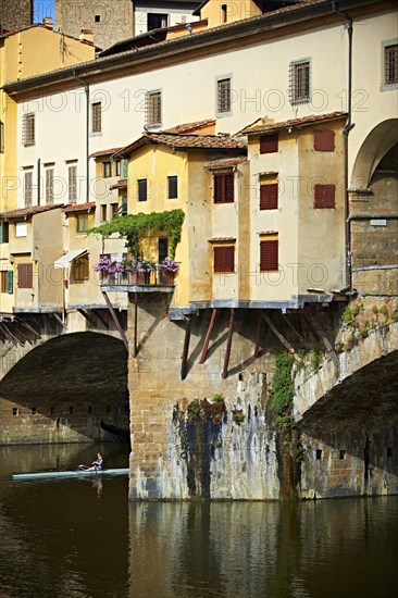 The medieval Ponte Vecchio bridge crossing the River Arno in the historic centre of Florence