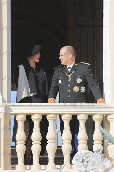 Princess Charlene and Prince Albert II. of Monaco at the Prince's Palace on Fete du Prince national holiday