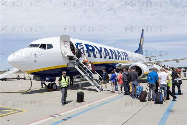 Passengers boarding the Boeing 737-800 of low-cost airline Ryanair at Frankfurt-Hahn Airport