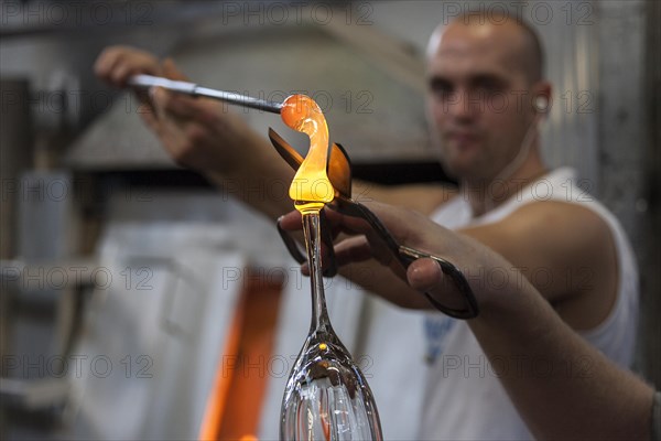 Glassblowers in the Orrefors Kosta Boda