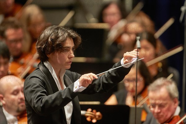 Polish conductor Marzena Diaku conducts a concert of the State Orchestra Rheinische Philharmonie