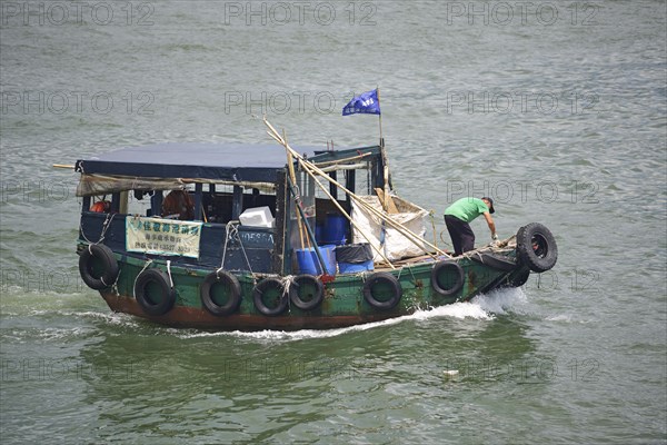 Old traditional fishing boat on the Hong Kong River